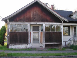 The bungalow grocery at NE 27th and Going at low ebb, about 2002. This photograph shows just how far down the building had faded during its later years and why it was a leading candidate for the wrecking ball. Photo courtesy of Chad Crouch.